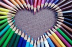 Colored pencils arranged in the shape of a heart.jpg